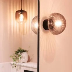 16 vägglampa, klar/mässing